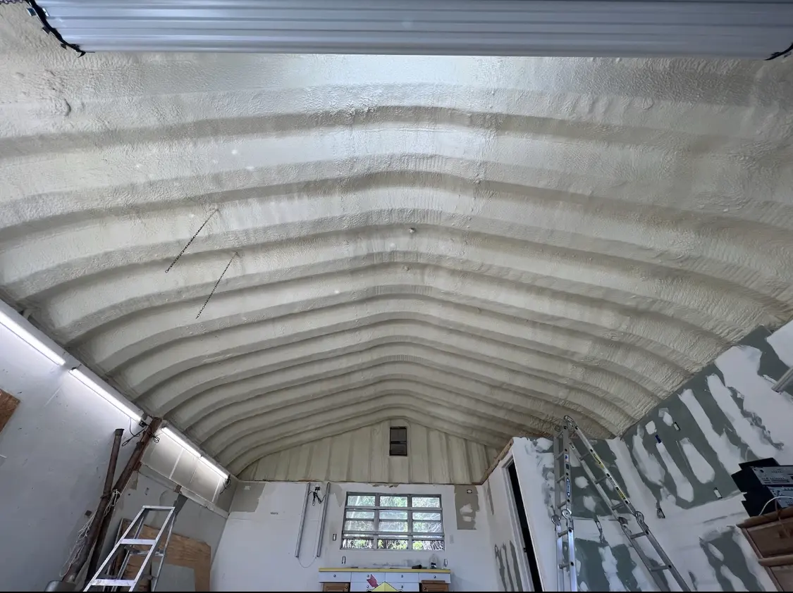 Spray polyurethane foam applied to the underside of a metal roof deck in Honey Brook